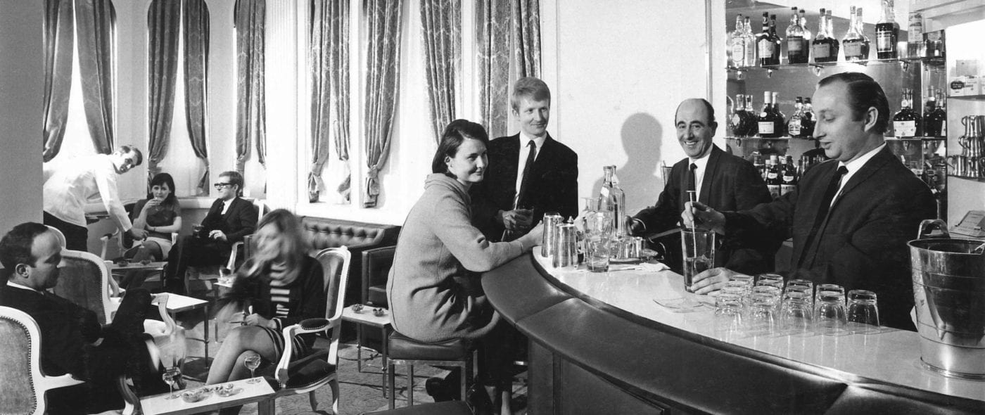 People sitting in historical American Bar at the Stafford London Hotel